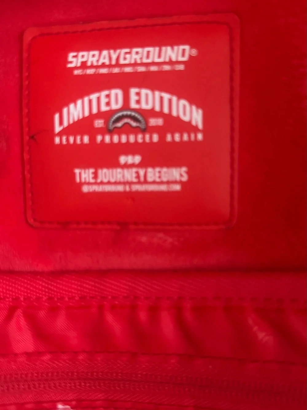 Sprayground Black, White & Red Shark Graphic Backpack